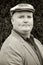 Portrait capture of a male with jacket and hat