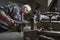 Portrait of Carpenter Working in Workshop