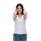 Portrait of casual woman making ok sign whilte standing