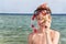 Portrait of caucasian boy at the beach with snorkeling mask and