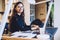 portrait of Caucasian millennial woman blogger smiling at camera