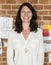 Portrait of Caucasian woman against brick wall