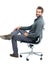 Portrait, chair and happy with a business man in studio isolated on a white background for marketing. Mindset, mission