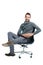 Portrait, chair and happy with a business man in studio isolated on a white background for marketing. Vision, mindset