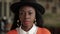 Portrait of charming african woman in stylish black hat