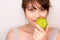 Portrait charming beautiful healthy woman. Attractive girl hold green apple. Pretty asian woman love to eat fruit