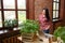 Portrait of a charming young female gardening