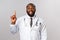 Portrait of cheerful african-american male doctor explain one simple task for patient stay healthy, not getting covid19