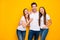 Portrait of cheerful buddies with long ginger foxy hair have fun laugh wear white t-shirt denim jeans isolated over