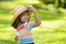 Portrait of cheerful child in summer nature park. Cute joyful little boy kid. Close up portrait of funny little child