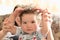 Portrait of a cheerful child with tousled hair. child 1-2 years old