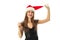 Portrait of cheerful cutie woman in santa hat