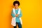 Portrait of cheerful dream afro american girl cross hands feel content emotions enjoy autumn holidays wear good stylish