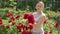 Portrait of cheerful female gardener