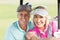 Portrait of cheerful golfer couple