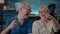 Portrait of cheerful grandparents laughing in front of camera