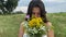 Portrait cheerful young woman amidst picturesque meadow in twilight