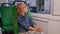 Portrait of child girl passenger riding at public modern bus or tram transport, looking out window