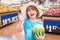 Portrait of child hold watermelon in grocery shopping in supermarket, Concept of shopping, healthy food, sell and buy.