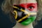 Portrait of a child with a painted Vanuatu flag