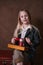 Portrait of child with small sewing machine. retro style