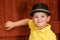 Portrait of child wearing fedora hat
