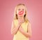 Portrait, children and lips with a girl on a pink background in studio holding a mouth prop. Kids, emoji and kiss with