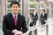 Portrait Of Chinese Businessman Outside Office