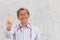 Portrait of Chinese doctor healthy old man Asian elder standing smile hand victory sign with space for text