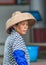 Portrait of a Chinese female worker with a straw hat, Sanya, China