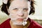 Portrait close-up woman applying rejuvenating facial mask on h