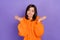 Portrait of clueless lady shrug shoulders arms palms dont know isolated on purple color background