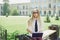 portrait of college student outdoors on campus