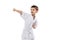 Portrait of concentrated little sportsman training karate poses isolated over white background