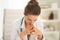 Portrait of concerned doctor woman in office