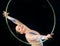 Portrait, concert with a gymnastics hoop and a woman in the gym for a performance showcase or practice. Training