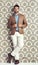 Portrait, confidence and man in suit on a vintage wallpaper background isolated in studio for fashion. Serious, style