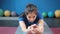 Portrait of confident Asian young woman doing stretching exercise reach out to bare foot by hands