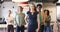 Portrait of confident diverse businesswomen standing in office looking to camera, in slow motion