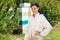 Portrait Of Confident Female Beekeeper At Apiary