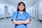 Portrait of confident female doctor in hospital