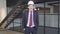 Portrait of confident foreman in suit and hard hat posing in new apartment. Confident handsome positive Caucasian man