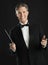 Portrait Of Confident Male Music Conductor Holding His Baton