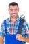 Portrait of confident male repairman holding adjustable wrench