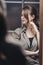 Portrait of a confident smiling girl , reflection in the mirror of a beautiful young woman ready, concept female success and
