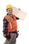 Portrait of constructor carrying wooden board with helmet and uniform