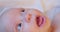 portrait of contemporary cute little curious newborn baby with attentive look.extreme close-up