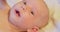 portrait of contemporary cute little curious newborn baby with attentive look.extreme close-up