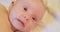 portrait of contemporary cute little curious newborn baby with attentive look.extreme close-up
