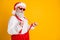 Portrait of cool confident santa claus modern hipster celebrate christmas party time pull red suspenders isolated over